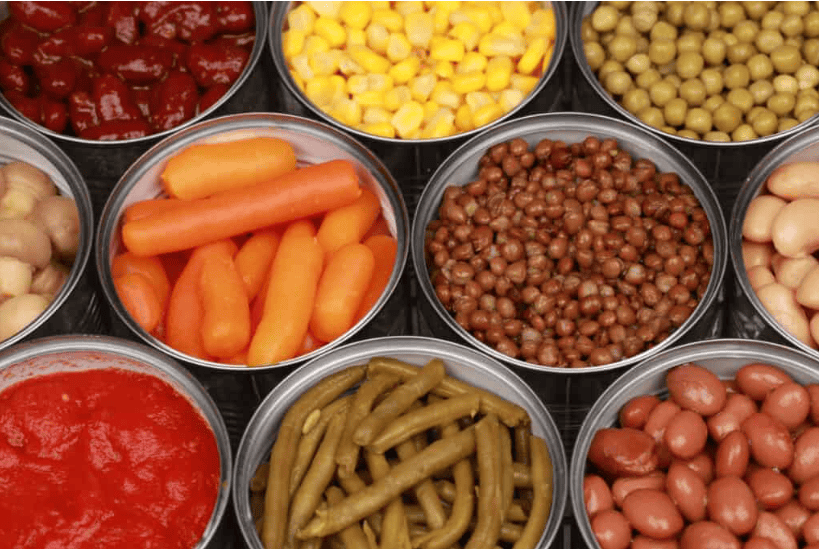 Canned vegetables in variety for emergency water storage.